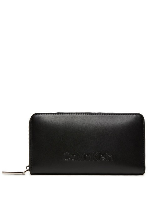 CALVIN KLEIN EMBOSSED CALVIN  Portfel zapinany na suwak czarny - Portfele damskie