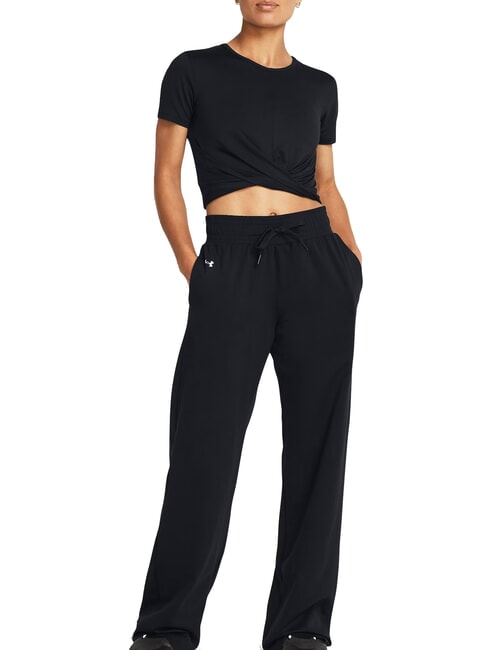 UNDER ARMOUR MOTION OPEN Spodnie sportowe czarny - Dresy sportowe damskie