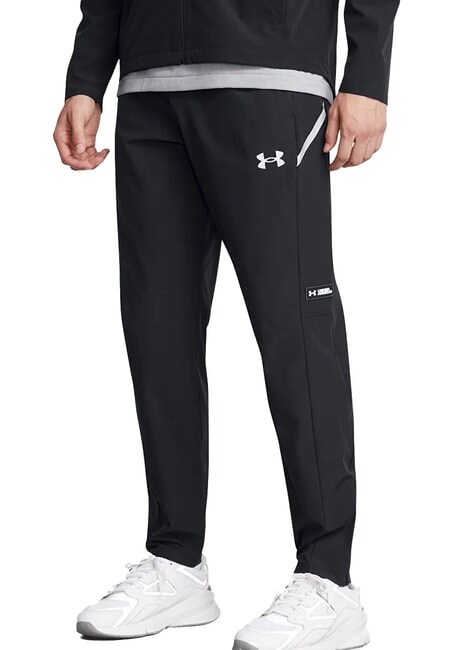 UNDER ARMOUR WOVEN Spodnie sportowe czarny - Dresy sportowe męskie