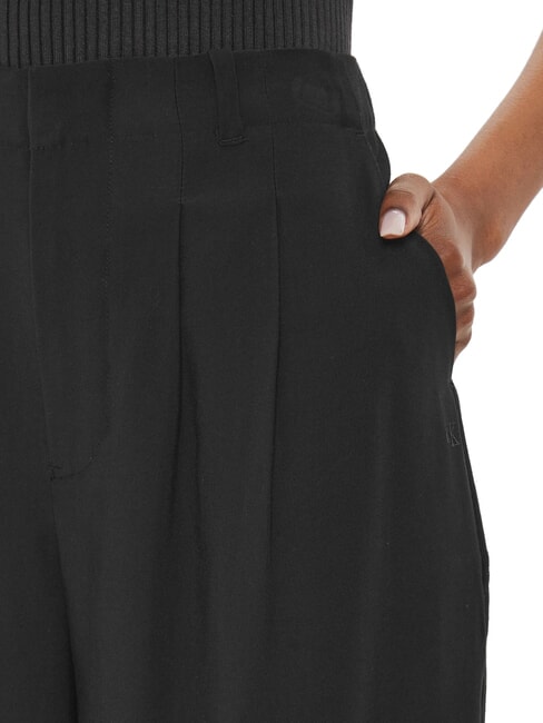 CK JEANS Spodnie z wysokim stanem i zakładkami ck czarny - Spodnie damskie