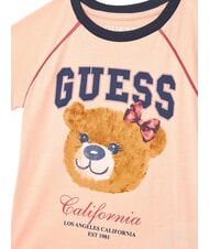 GUESS KIDS Koszulka z kr&oacute;tkim rękawem z nadrukiem misia brzoskwiniowy wsch&oacute;d słońca - Koszulka dziecięca - 3
